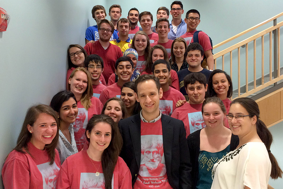 A group of students in the Politics and Values Program standing together on a stairway.