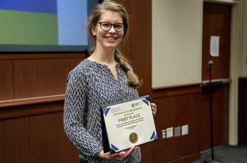 2019 PhD candidate Elixabeth Pertner receiving first place in the Three Minute Thesis competition hosted by CCAS. 